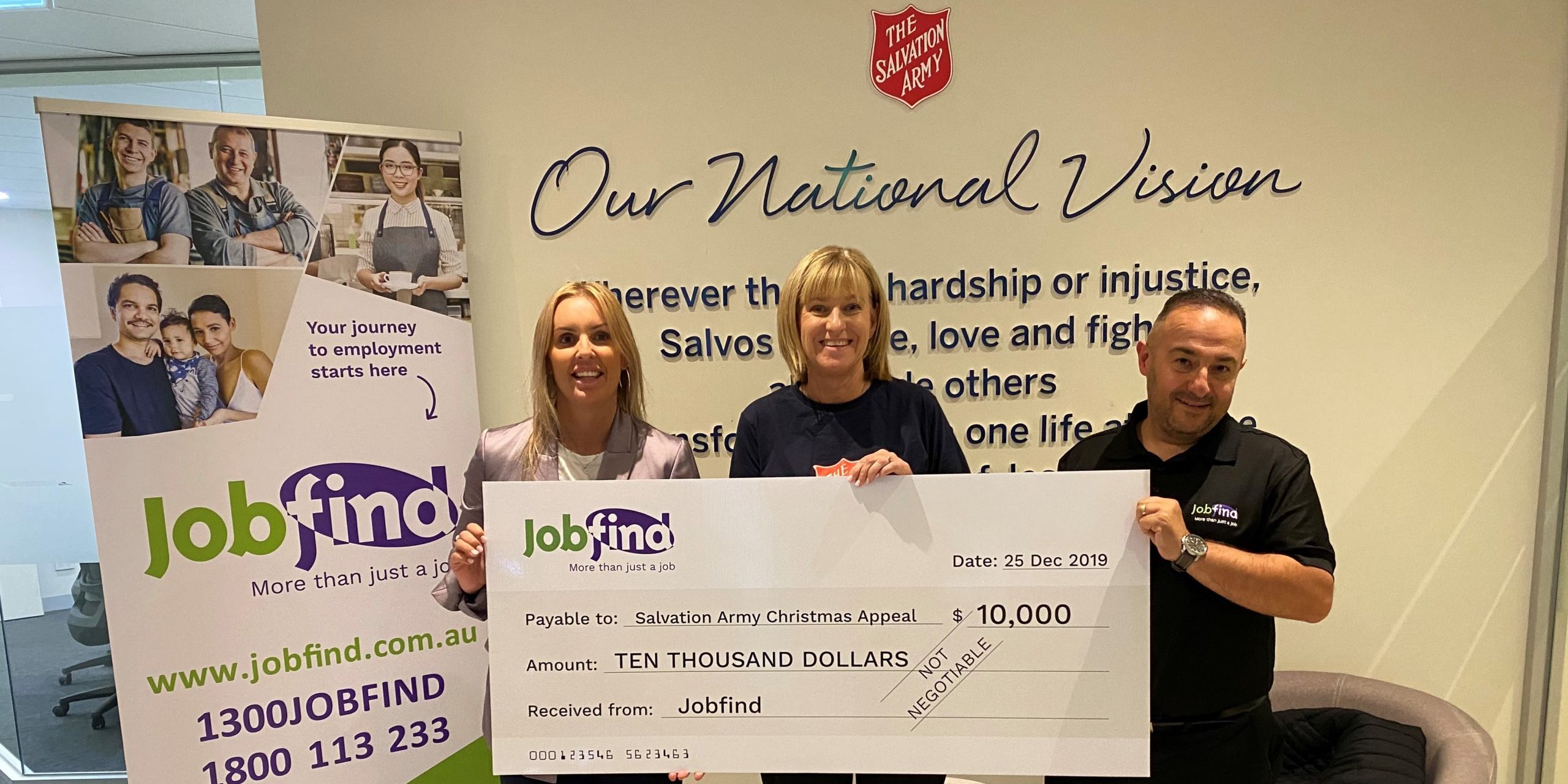 Salvation Army Cheque - image of Jobfind staff holding oversized cheque made out to Salvation Army Christmas Appeal