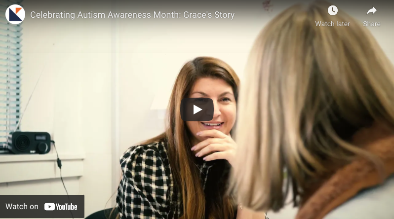 Autism Awareness Vide - image of a woman smiling at a woman sitting opposite her
